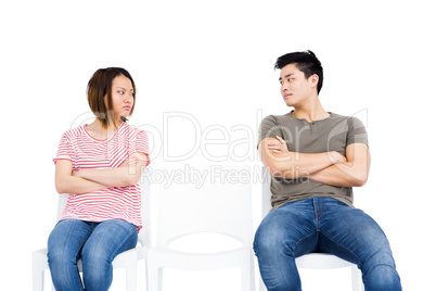Young couple ignoring each other