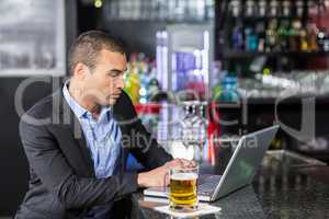 Businessman using his laptop