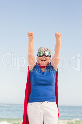 Senior woman pretending to be a superhero