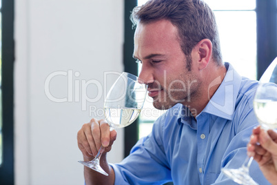 Young man having wine