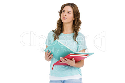 Young woman holding books