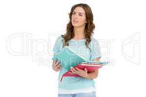 Young woman holding books