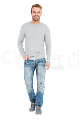 Young man standing with hands in pocket