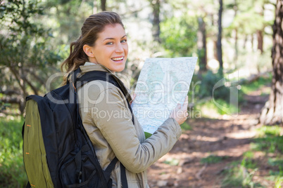 Smiling woman with backpack Smiling woman with backpack