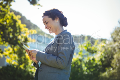 Businesswoman using smartphone