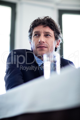 Thoughtful businessman in restaurant