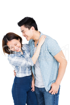 Happy young couple embracing each other