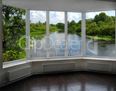 modern window of veranda overlooking the river