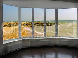 plastic window with beautiful view of marine waves