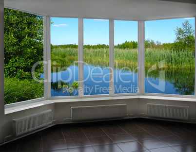 modern window of veranda overlooking the river