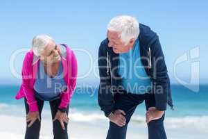 Mature couple tired after running