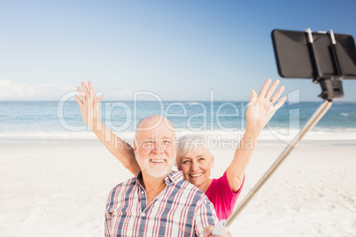 Senior couple taking selfie