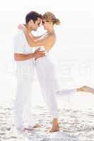 Romantic couple embracing on the beach