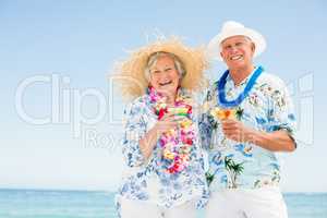 Senior couple drinking cocktails