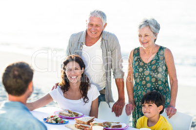 Happy family having a picnic at the beach