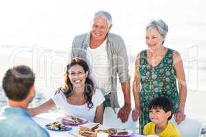 Happy family having a picnic at the beach