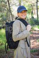 Smiling woman with backpack