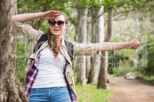 Portrait of woman hitch hiking