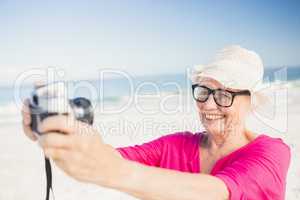 Senior woman taking selfie