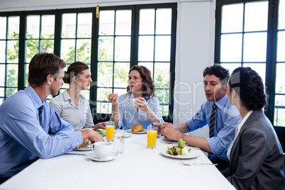 Business people having a meeting in restaurant