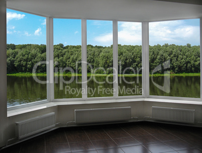 modern window of veranda overlooking the river