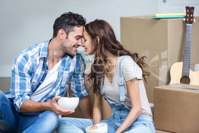 Romantic couple having noodles
