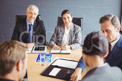 Businesspeople in conference room