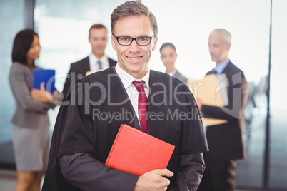 Lawyer holding a law book