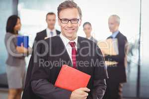 Lawyer holding a law book