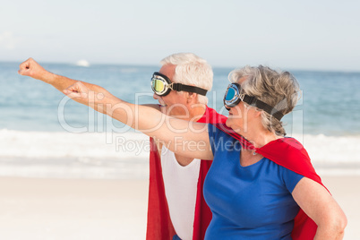 Senior couple wearing superman costume