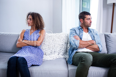 Upset young couple ignoring each other