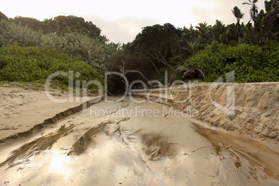 River Bed Running Over Beach in Sea