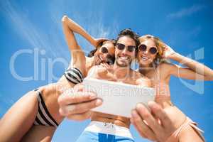 Happy friends having fun on beach