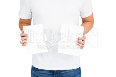 Man holding torn bill