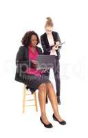 Two business woman working.