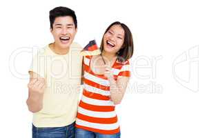 Excited couple holding flag
