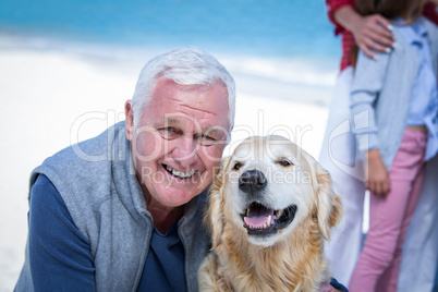 Senior man posing with his dog