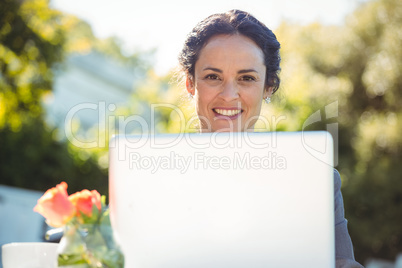 Businesswoman using laptop