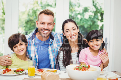 Portrait of cheerful parents and children