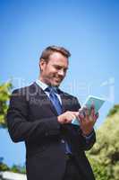 Businessman using tablet