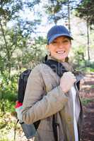 Smiling woman with backpack