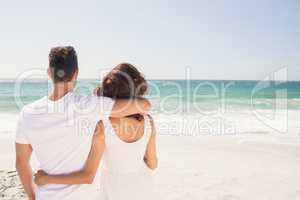 Young couple looking at the beach