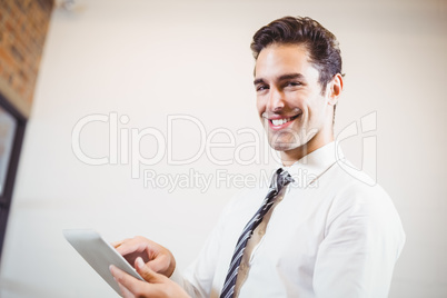 Portrait of smart businessman using digital tablet Portrait of smart businessman using digital tablet