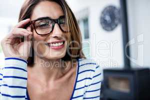 Happy beautiful young woman wearing eyeglasses