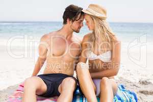 Young couple romancing on the beach