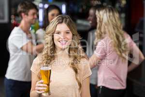 Smiling friends having beers