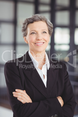 Confident businesswoman looking away