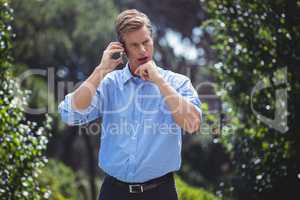 Focused man having a conversation on the phone