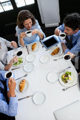 Business people having a meeting in restaurant