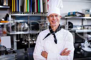 Portrait of chef posing in commercial kitchen